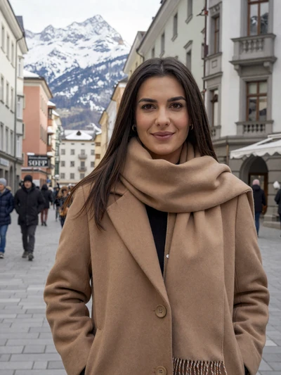 Katharina, 27, a brunette Austrian woman in Innsbruck with Alpine mountains in background