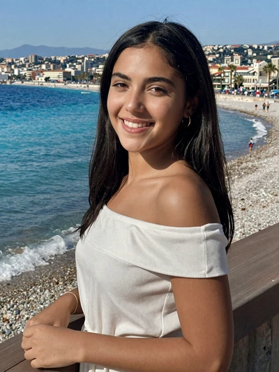 Inès, 24, a dark-haired French woman on the Promenade des Anglais in Nice