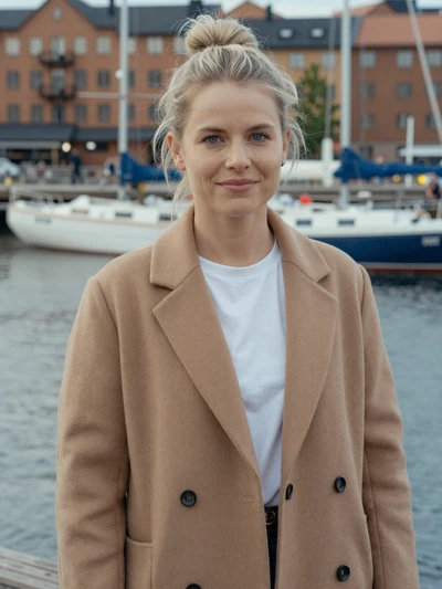 Astrid, 27, a Swedish woman with ash blonde hair on the Gothenburg waterfront