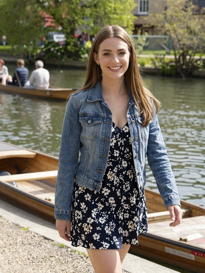 Jessica, 25, a brunette British woman walking along the river in Cambridge