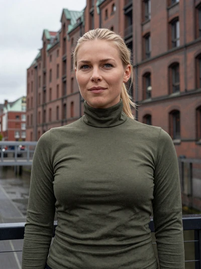 Katrin, 30, a confident German woman near Hamburg warehouses representing German dating customs