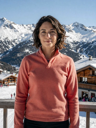 Aina, 33, a sporty Andorran woman at a ski lodge terrace in Canillo