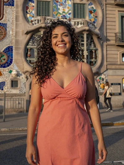 Lucia, 25, a joyful Spanish woman on a Barcelona street